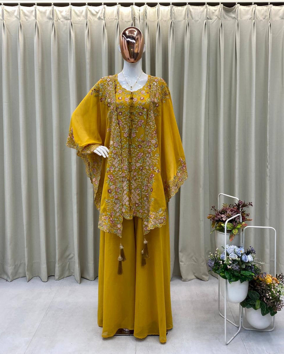 Mannequin wearing a yellow floral dress with a curtain background